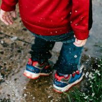 Child playing in Rain